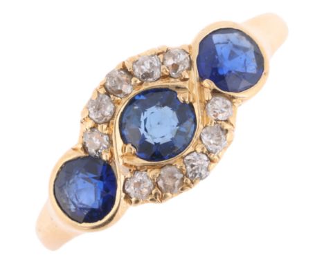 An 18ct gold sapphire and diamond cluster half hoop ring, principal sapphire measures approx: 3.87mm x 2.50mm, setting height