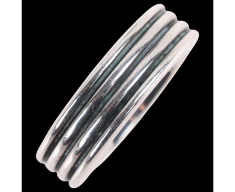 ERIK GRANIT - a Finnish oxidised sterling silver band ring, ribbed decoration, band width 6.9mm, size T/U, 11.5gNo damage or 