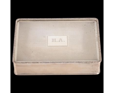 A George V silver table snuff box, William Base & Sons, Birmingham 1924, rectangular form with allover engine turned decorati