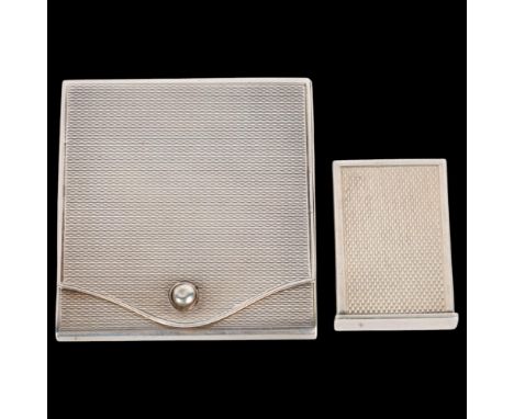 A Danish silver pillbox, 3.5cm x 2.5cm, and a German silver matchbook holder, 5.5cm x 5cm, both with engine turned decoration