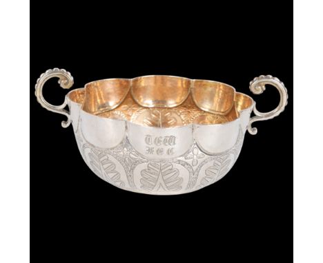 A 19th century silver Bernegal 'Drinking Cup' 2-handled bowl, possibly Portuguese, circular lobed form, with engraved decorat