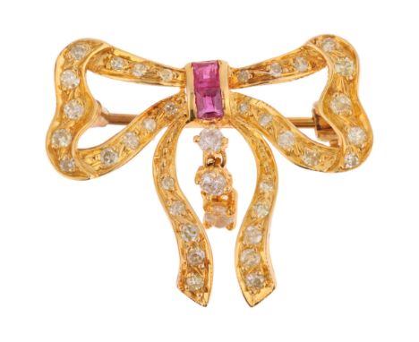 An 18ct gold ruby and diamond ribbon bow brooch, channel set with rectangular step-cut rubies and single-cut diamonds with en