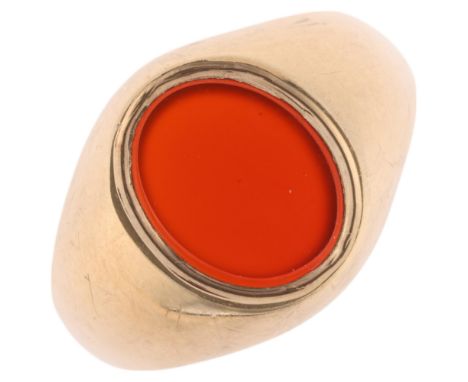 A 9ct gold carnelian signet ring, maker LA, Birmingham 1977, setting height 13.1mm, size O, 3.7gNo damage or repair, carnelia