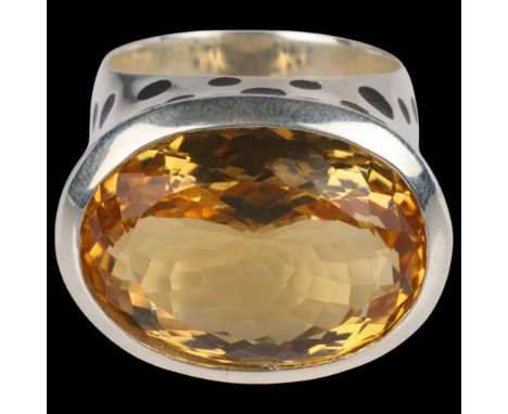 A large sterling silver citrine and black enamel leopard ring, setting height 20.7mm, size V, 20.8gNo damage or repair