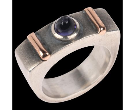 G SLINE - a Danish modernist sterling silver signet ring, rub-over set with high round cabochon amethyst with textured rose g