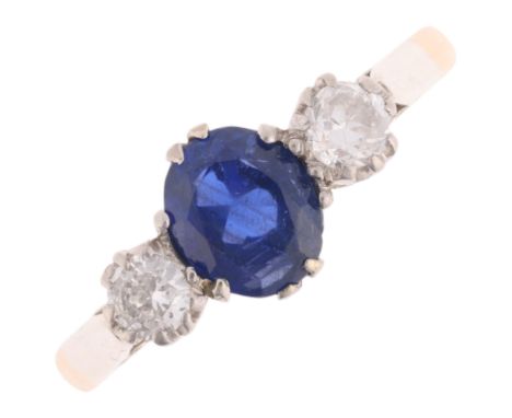 An 18ct gold three stone sapphire and diamond ring, set with 1ct oval mixed-cut sapphire flanked by round-cut diamonds, total
