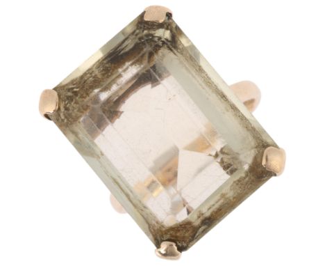 A 9ct gold citrine dress ring, maker AEW, London 1966, set with rectangular step-cut citrine, setting height 20.8mm, size M, 