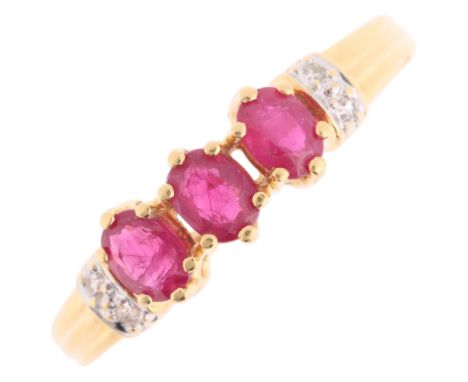 An 18ct gold ruby and diamond dress ring, claw set with oval mixed-cut rubies and single-cut diamonds, setting height 5.3mm, 