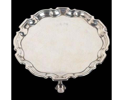 A George II circular silver salver, Denis Langton, London 1733, scalloped border raised on 3 scrolled feet, 15.5cm, 7.5ozNo d