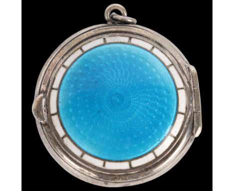 An Art Deco Edwardian silver and enamel pendant compact, Levi & Salaman, Birmingham 1905, circular form with engine turned bl