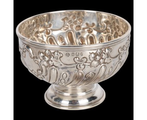A late Victorian silver pedestal bowl, William Hutton & Sons Ltd, Sheffield 1898, circular form with relief embossed half flu