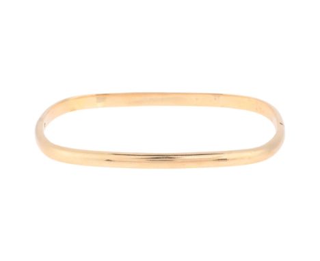 A 14ct gold hinged bangle, rounded rectangular form, band width 4.1mm, internal circumference 18cm, 8.8gNo damage or repair, 
