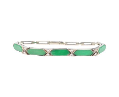 An Art Deco jade and diamond geometric panel bracelet, set with polished lozenge-cut jade and single-cut diamond accents, unm