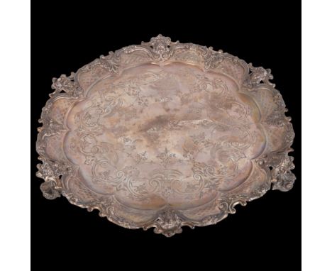 A Victorian circular silver salver, Edward & John Barnard, London 1858, lobed form with relief cast and Classical mask decora