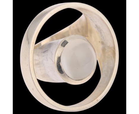 A large sterling silver moonstone openwork ring, rub-over set with round cabochon moonstone, setting height 27.6mm, size P, 1