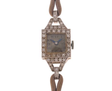 A lady's Art Deco platinum diamond mechanical cocktail wristwatch, by Isis, circa 1920s, silvered dial with Arabic numerals, 
