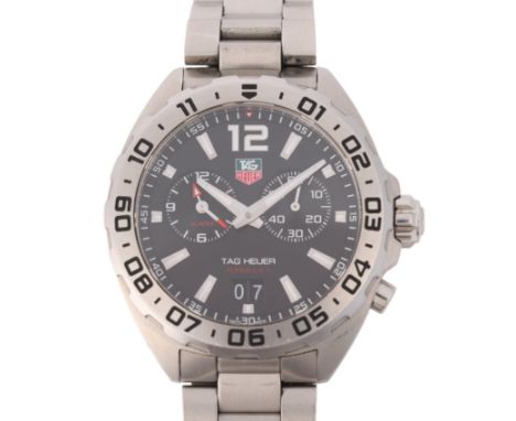 TAG HEUER - a stainless steel Formula 1 Alarm quartz calendar bracelet watch, ref. WAZ111A, circa 2017, black dial with silve