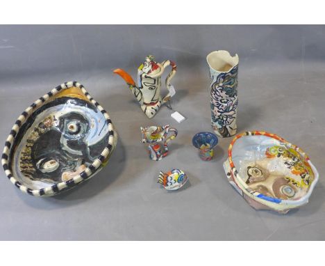 Jane Staniland (British, b.1963), a collection of earthenware items, of undulating forms with vivid glazes and abstract paint