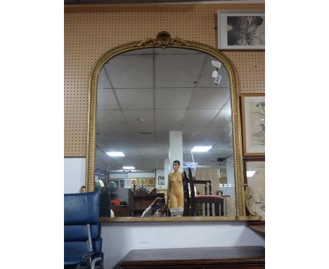 A large Victorian style giltwood overmantel mirror, with shell and flower finial, 142 x 115cm 
