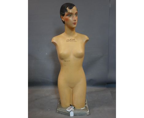 An Art Deco French mannequin, marked 'A La Violette - Marque Deposse', on stepped base, H.116cm 