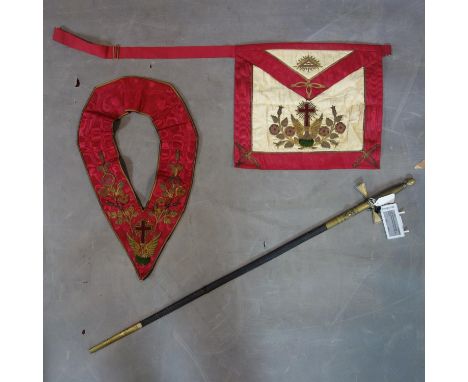 A late 19th century Masonic ceremonial sword, with bass handles, brass and leather scabbard, the 83cm blade decorated with sc