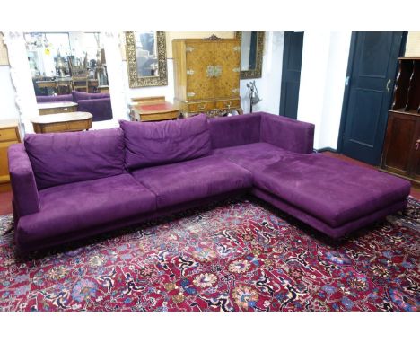 A contemporary corner sofa by 'IL Loft' with purple velvet upholstery 