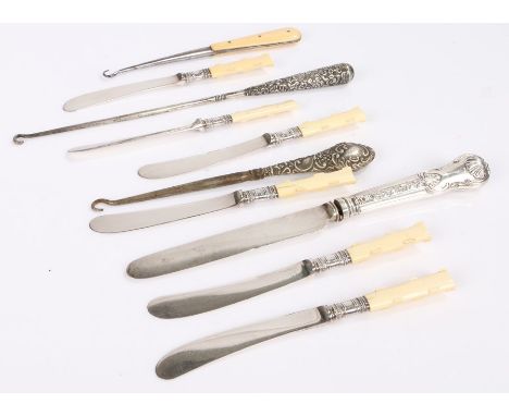 Set of six fruit knives with silver collars, silver handled knife, two silver handled button hooks, none handled button hook 