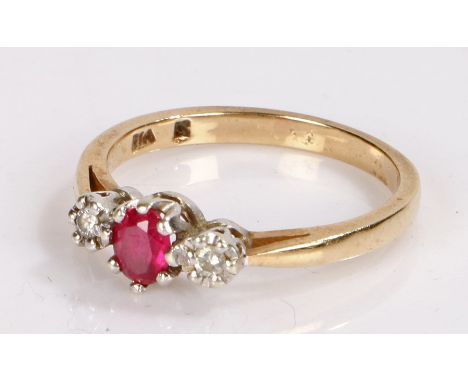 9 carat gold ring with central ruby flanked by two diamonds, ring size O1/2, 2.7g