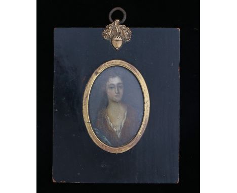 Late 17th Century portrait miniature of a lady, housed in an ebonised frame with gilt slip and acorn hanging loop, 8.5cm x 10