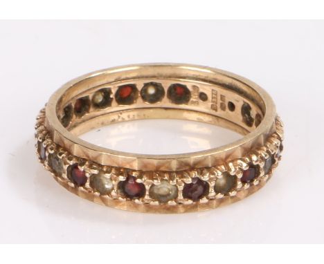9 carat gold eternity ring, set with garnets and clear paste, ring size, ring size P, 3.4g