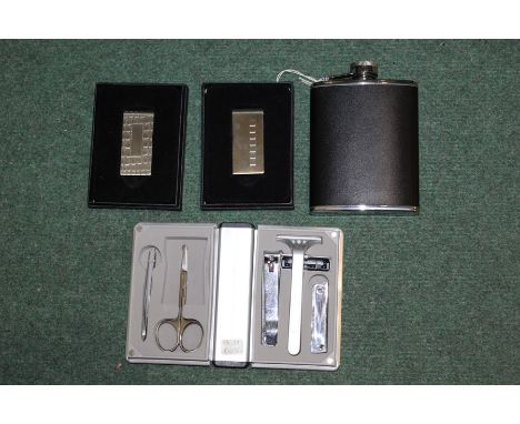 Collection of silver plated gents items, to include a flask, shaving kit and two money clips (4)