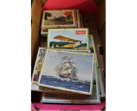 Ten Victory jigsaw puzzles to include traction engine, HMS Victory etc. (10)