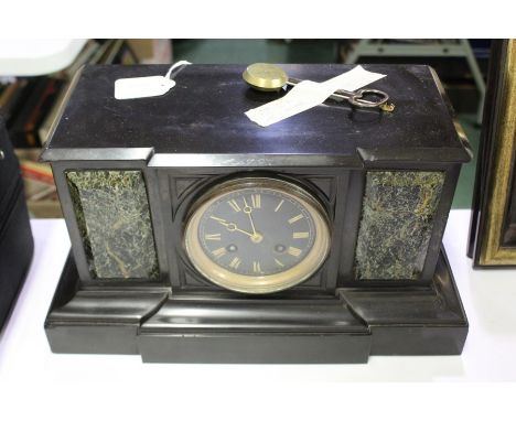Edwardian slate and marble mantle clock, with break-front case, the black dial with Roman numerals, flanked by green and blac