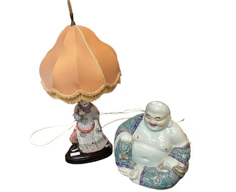 Large seated oriental Buddha and oriental table lamp with shade, some damage.&nbsp; Buddha is circa 28 cm H x 28 cm W