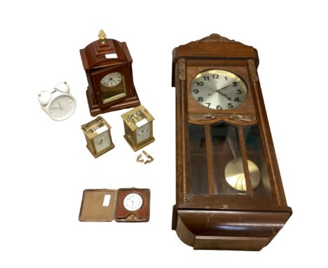 A mixed lot of clocks, to include a Lund Hatton Garden London mantle clock, a carriage clock by Hamilton and Co Calcutta with