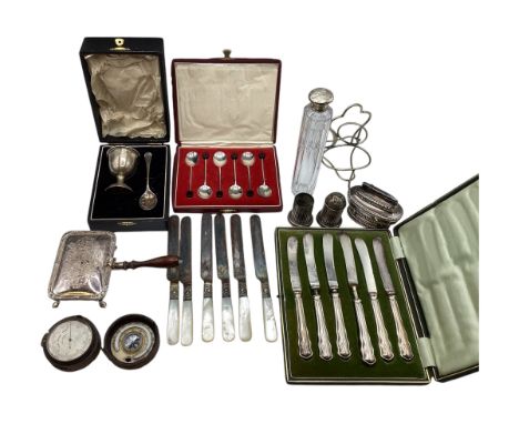 A collection of sterling silver and white metal items to include a boxed set of coffee spoons with bean finials, silver handl