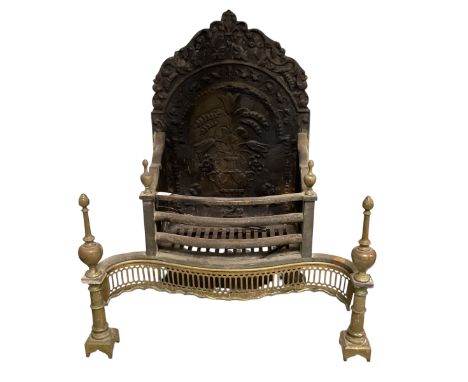 An integrated, heavy, cast iron and brass fireback and grate with brass grill and upstands