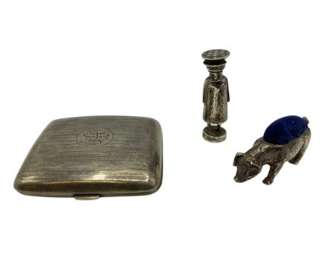 A collection of small sterling silver items to include a weighted pig pin cushion , a pepperette in the form of gentleman wea