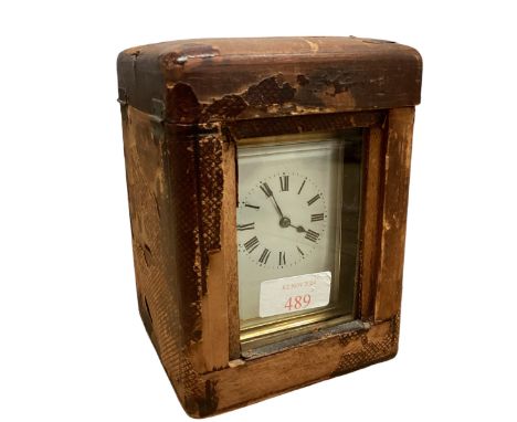 A late 19th century gilt brass carriage clock in fitted travel case. Case 15cm(h) 