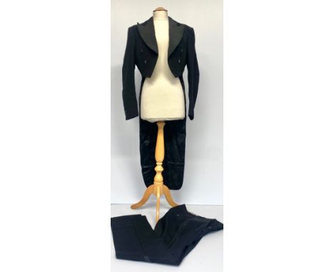 A "white tie and tails" black jacket and trousers,  label Jackson the Tailor, small and An Elizabeth Arden Vanity case/jewell