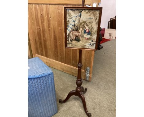 A mahogany and tapestry  pole screen, 148 cm High