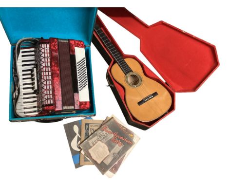 A cased accordian , Galotta label to front, and an old banjo, both as found with wear, see images for details