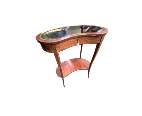 An Edwardian inlaid bijouterie kidney shaped display, with glazed top and shelf, some fading and wear, 67cm Wide x 43cm D x 7
