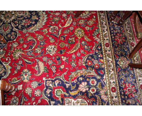 A Persian carpet, approximately 393 x 300cm