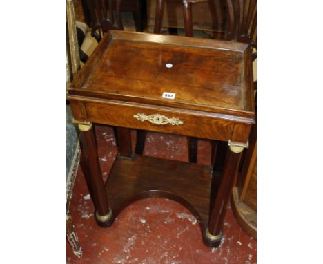 A French Empire style mahogany side table/console table, with blind frieze drawer and pillar supports 71cm high, 49cm wide, 3