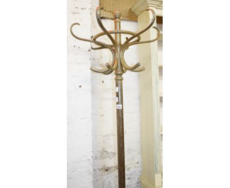 A bentwood hat/coat stand and an oak standard lamp