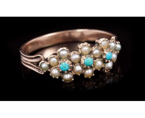 Regency seed pearl and turquoise forget-me-not ring with three stylised flower heads, on a reeded shank, circa 1820.  Ring si