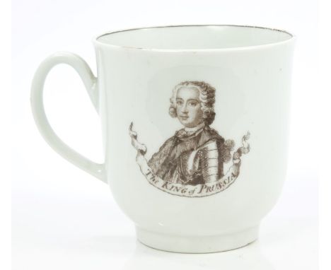 18th century Worcester coffee cup with notched loop handle, printed in black, by Robert Hancock, with the arms and crest of M