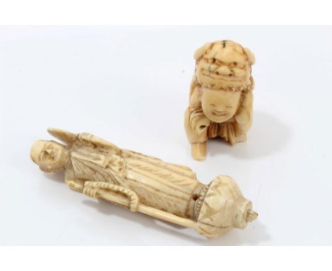 19th century Japanese carved ivory netsuke carved as a crouching figure, modelled wearing a mythical beast skin, 4cm high, to