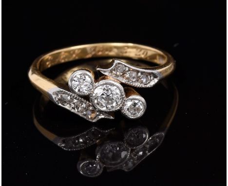 1920s diamond three stone engagement ring with three old cut diamonds estimated to weigh approximately 0.25 carats in total, 